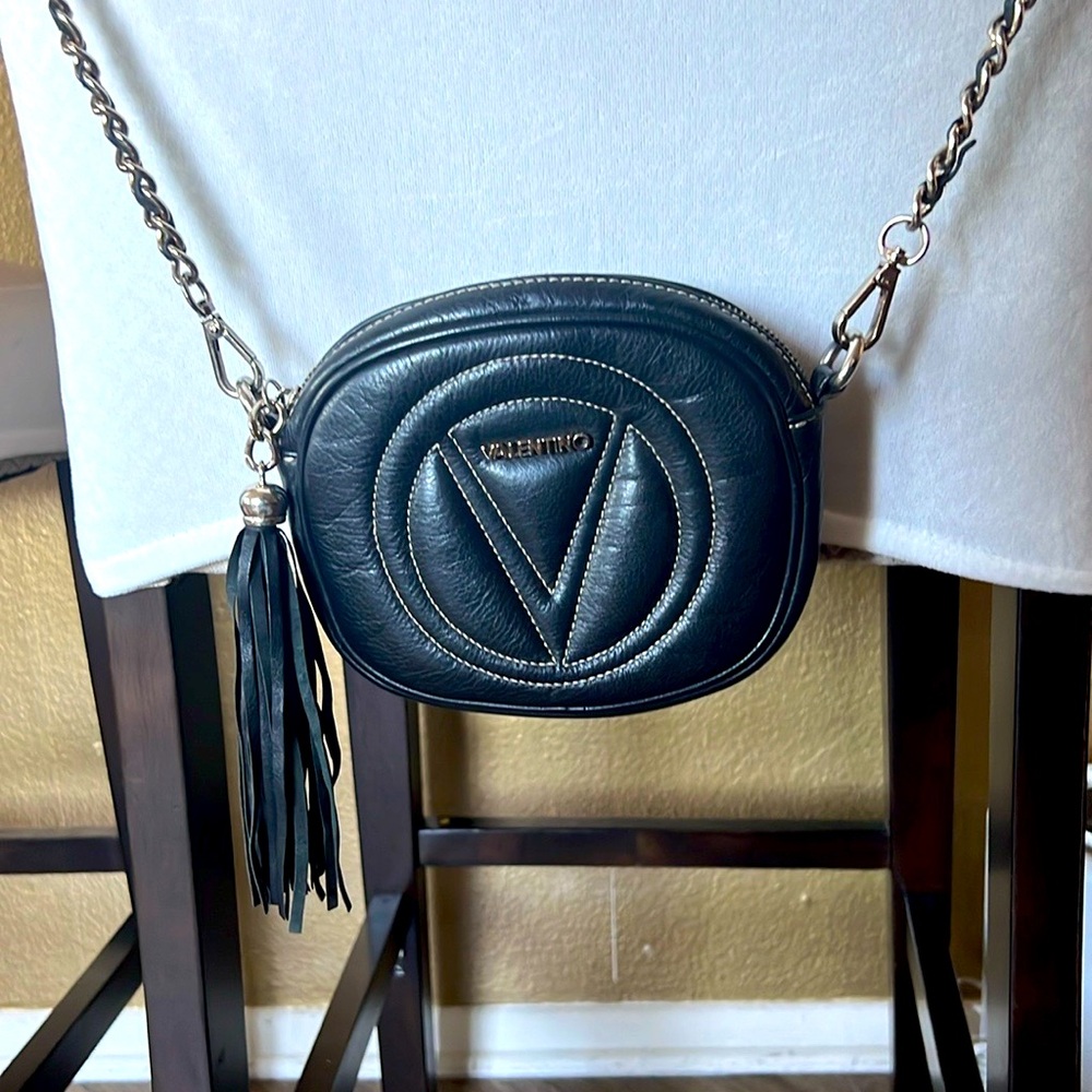 Valentino Crossbody chain purse black. One blemish on interior lining.